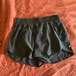 Lululemon black track that short size 10